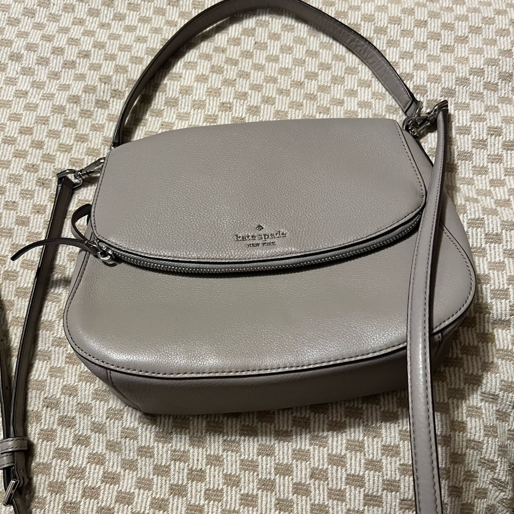Kate, spade gray leather handbag with a Crossbody strap